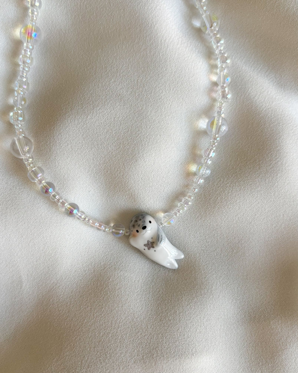 Collana bolle con foca