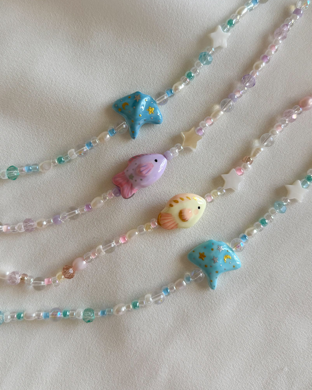 Bracciale pesciolino lilla