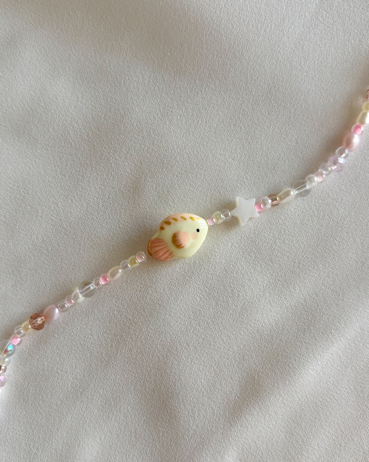 Bracciale pesciolino rosa
