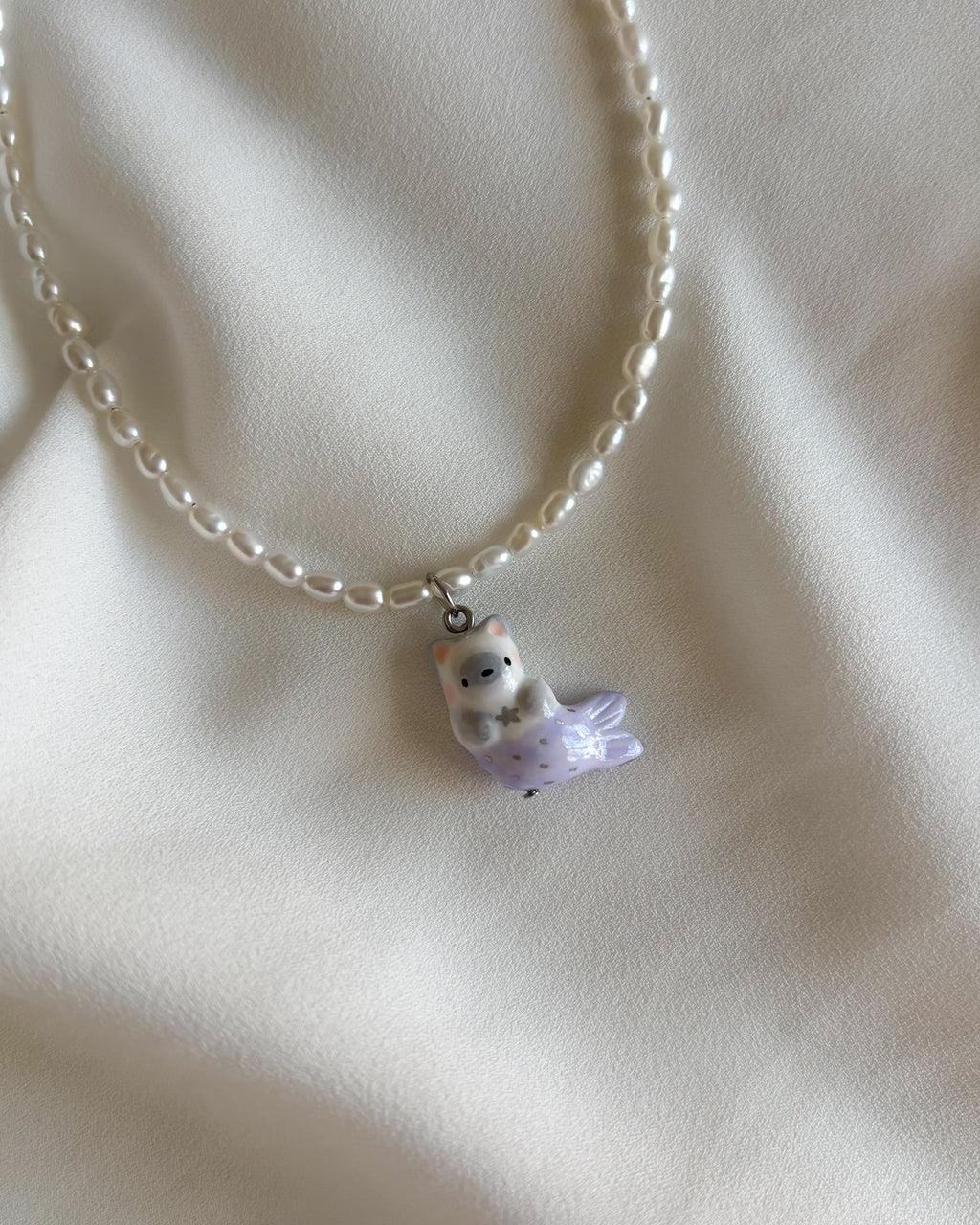 Collana di perle con gatto sirena