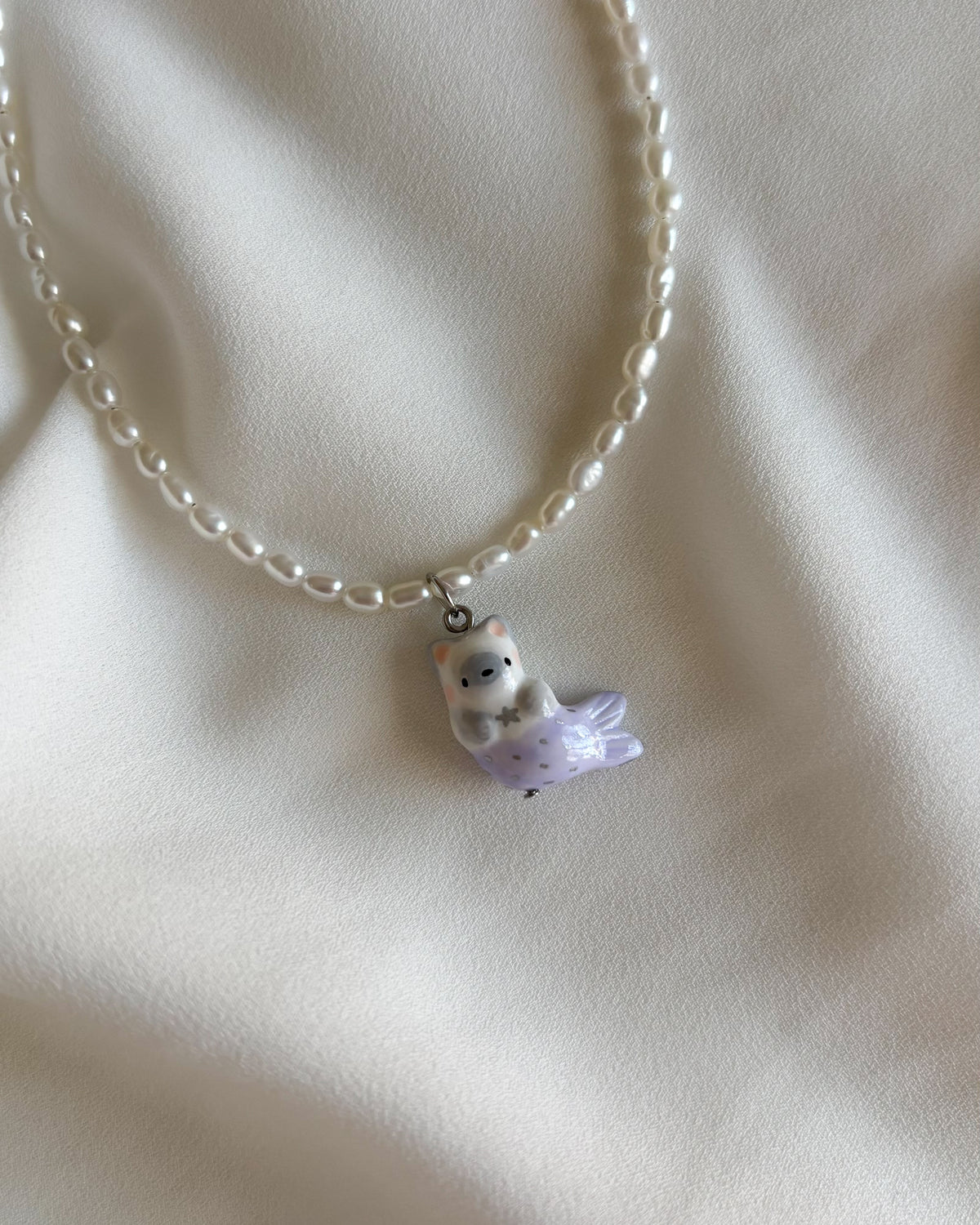 Collana di perle con gatto sirena