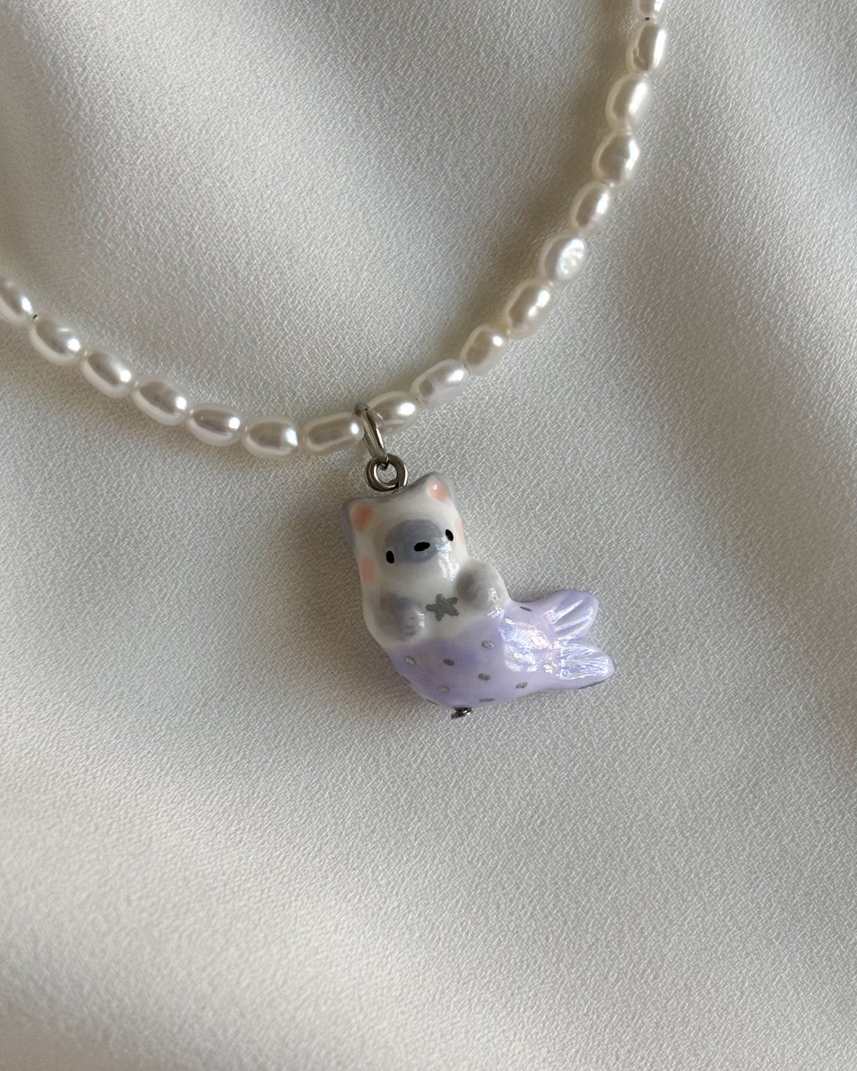 Collana di perle con gatto sirena