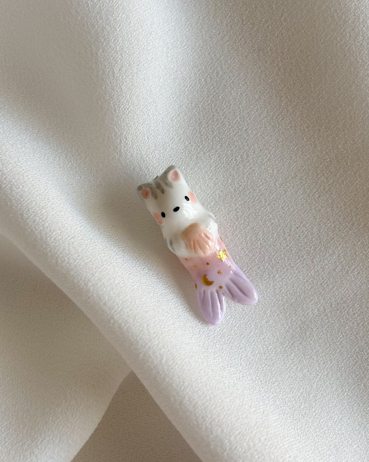 Gatto sirena lilla e rosa