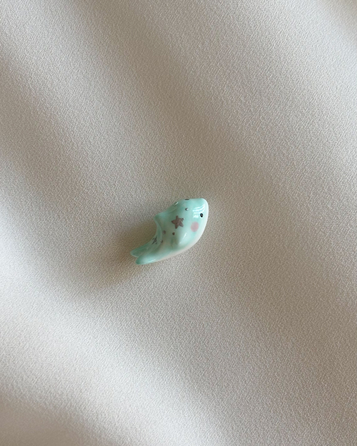 Delfino verde acqua