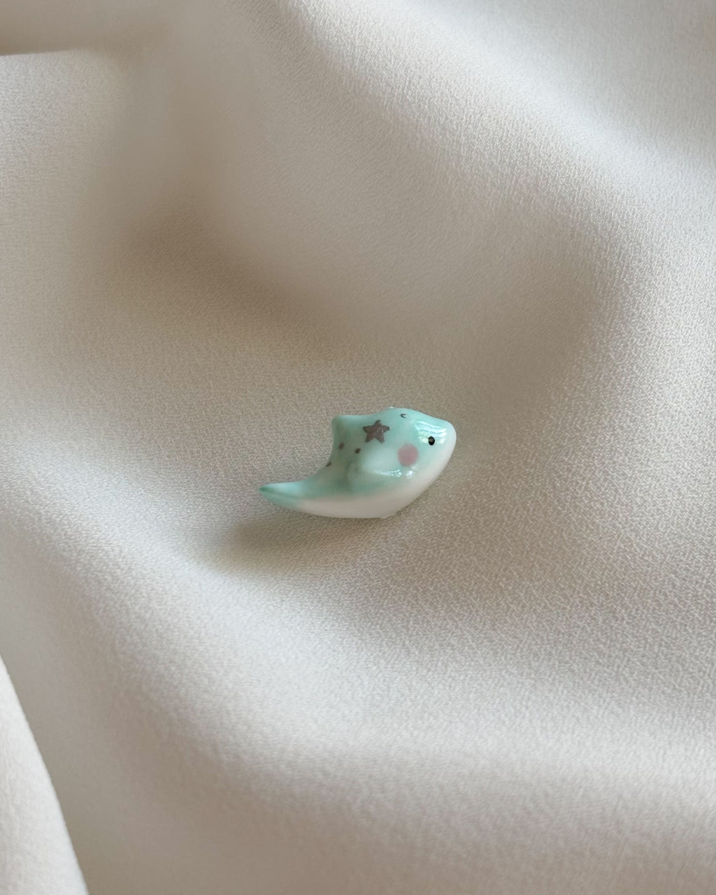 Delfino verde acqua